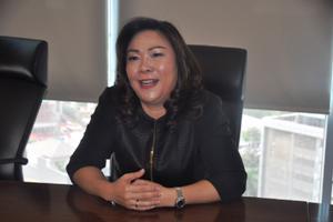Presdir Sun Life - Elin Waty